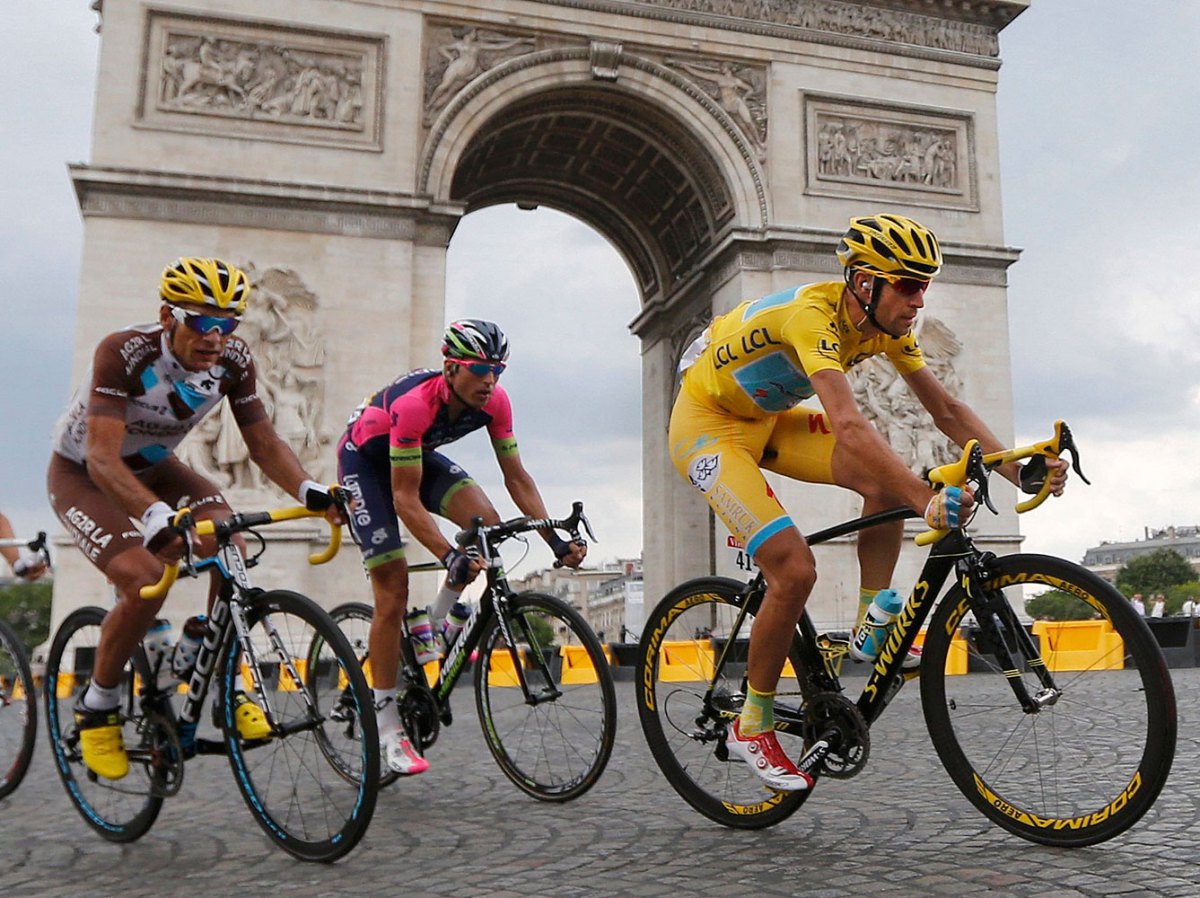 Race leader Astana team rider Nibali of Italy rides near the Arc de Triomphe at the end of the final 21st stage of the Tour de France in Paris